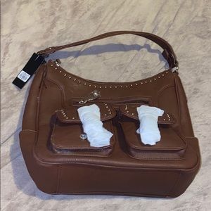 Concealed carry brown purse.